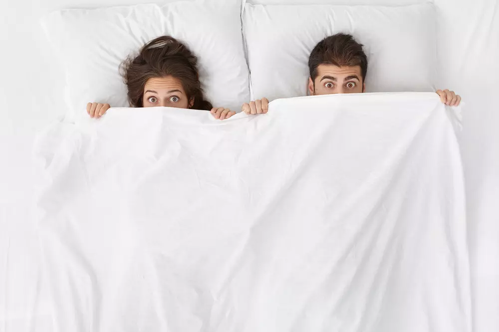 couple under the covers